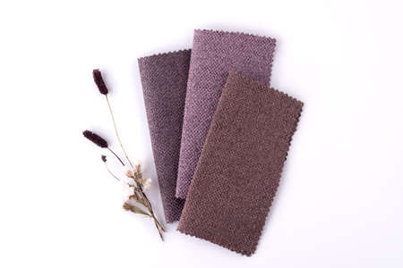 Trendy colors gunny textile samples on a white background. Fabric texture backgroundの写真素材