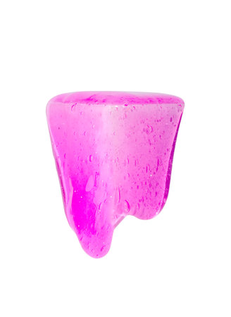 Slime, bright pink toy flows down of white box, against white background. World wide trendy toy isolated on a white.の写真素材
