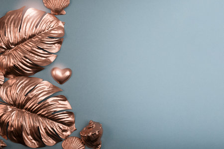 Gold Monstera leaves, seashells, and gold hearts collection frame top view. Hello, summer minimalist...