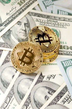 Physical Bitcoin on a United States Dollar Bills.の写真素材