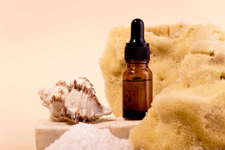 Spa And Beauty Care Set of Cosmetic oil Bottle Sea Sponge Soap and Various Shells.の写真素材