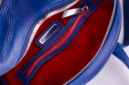 Redlining and Empty label inside blue leather backpack.の写真素材