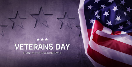 American Flag on the grey background with copy space . Veterans day concept.
