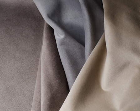 Light beige and grey colors velour textile samples. Fabric texture backgroundの写真素材