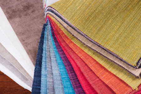 Furniture Textile samples. Soft upholstery fabrics. Collection of rough fabric for sofa, couch or chair. Tissue catalog.の写真素材