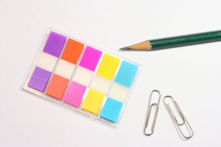 post-it small index, pencil and clipの写真素材