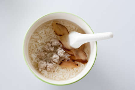 closeup boiled rice with minced pork and mushroomの写真素材