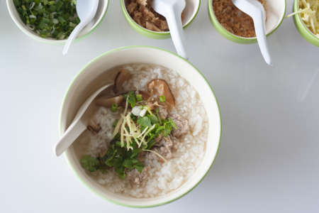 closeup boiled rice with minced pork and mushroomの写真素材