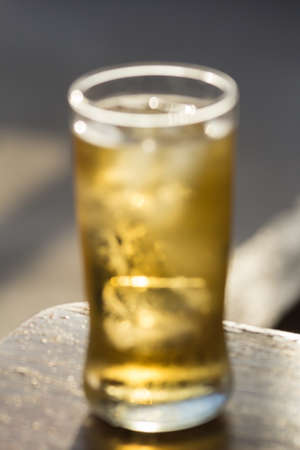 abstract blur glass of cold beerの写真素材