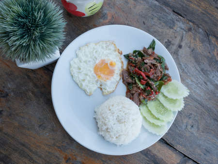 top view of fried basil beef with fried egg and riceの写真素材