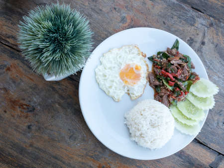 top view of fried basil beef with fried egg and riceの写真素材