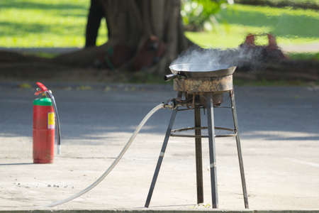pan on a gas burner, prepare for fire drillの写真素材