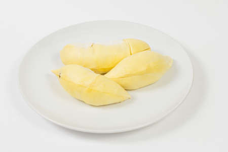 durian on white dishの写真素材