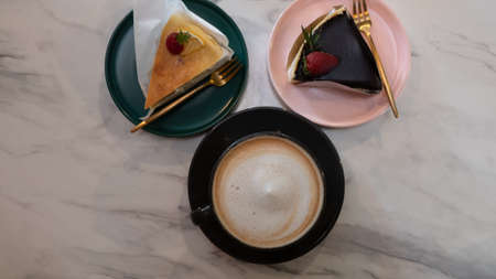 top view of hot coffee and cakeの写真素材