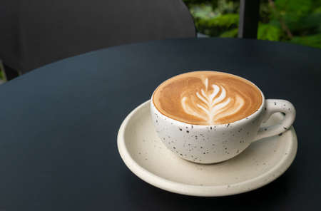closeup cup of coffee on tableの写真素材