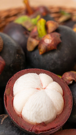 fresh ripe mangosteen fruits and cross sectionの写真素材