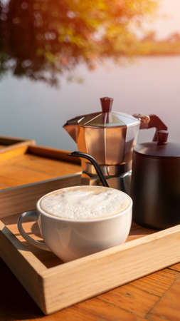 closeup cup of coffee and coffee brewing equipmentの写真素材