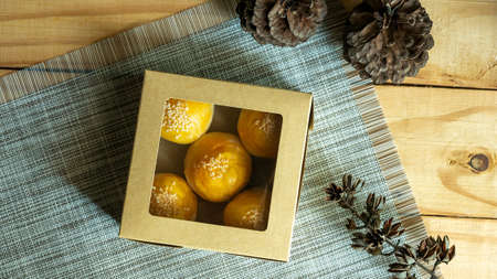 top view of bean cake with salted egg yolk in paper boxの写真素材