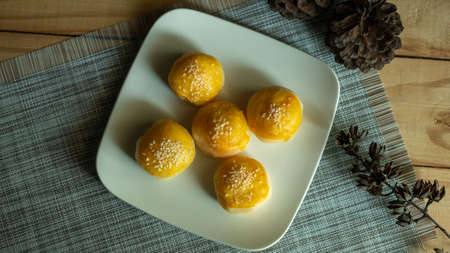 top view of bean cake with salted egg yolk on white plateの写真素材