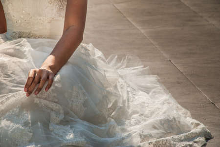 Close-up of the Bridal dress skirt While taking a pre-wedding photoの写真素材