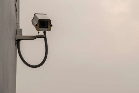 CCTV system, new technology, waterproof camera and built-in battery On a blurred sky backgroundの写真素材