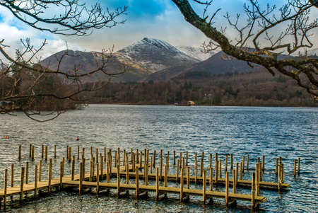 The marina in the Lake District area. with beautiful mountains as a backdrop.の写真素材