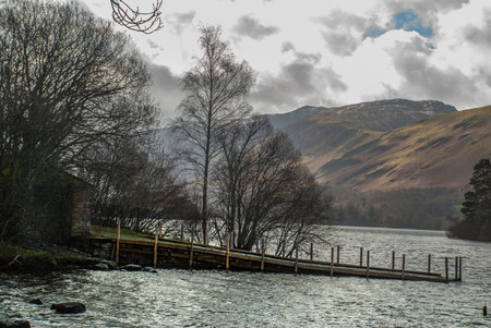 The marina in the Lake District area. with beautiful mountains as a backdrop.