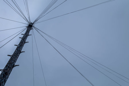 In the area London, the concept of wires with electric poles in the clear sky Suitable for making...