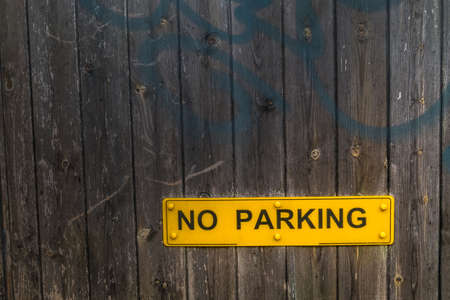 Do not park the car on the old wooden background Suitable for making background imagesの写真素材