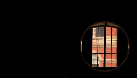 The view from the round window in the ancient building, suitable for background images. Free space...