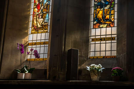 London - 23 Mar 2019 - Stained glass window illustrated Bible stories in the St Mary Abbots Church, Kensingtonのeditorial素材