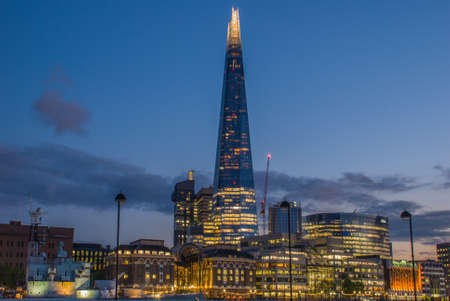 Sunset on the London skyline with the new The Shard skyscraper. Long exposure.