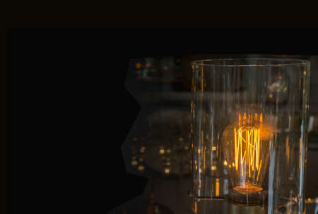 Beautiful Vintage / retro edison light lamp decor, light lamps electricity hanging decorate home interior. concept with copy space. Picture upside downの写真素材