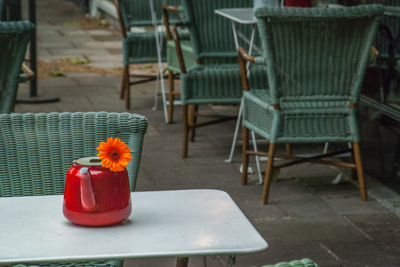 Empty cafe at the Street On a rainy day with comfy chairs and clean tables in London.の写真素材