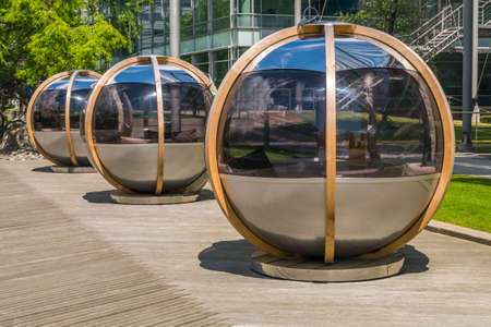 London 7 Jun 62 - Meeting pods in Chiswick Business Park offer private group discussions amid the relaxing, green park. BSI building in the background.のeditorial素材