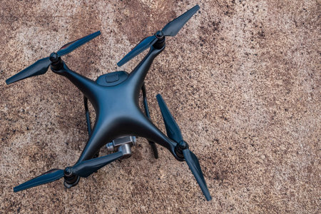 Quadcopter Drone Ready to Take Off. Modern Flying Gadget Waiting Command.