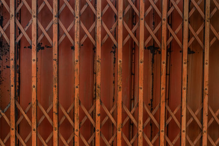 Ancient iron orange doors are very rusty for background, Steel folding gates, thailand, Vector illustration.の写真素材