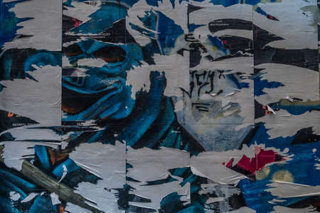 bangkok,Thailand - jun 29, 2019 : Old Urban Street Billboard With Torn Posters And Stickers, Background Or Texture With Copy Space, Toned Image.のeditorial素材