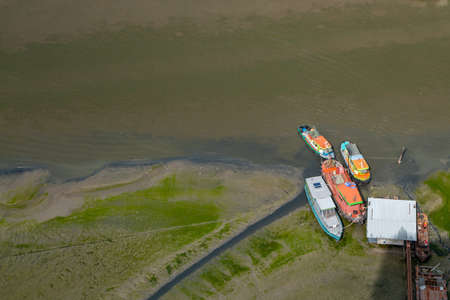 Bangkok, Thailand - Jul 05, 2019 : Many boats docked in the Chao Phraya River in the afternoon, Top view.の写真素材