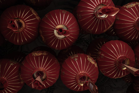 Many red Chinese lanterns in Interior at temple