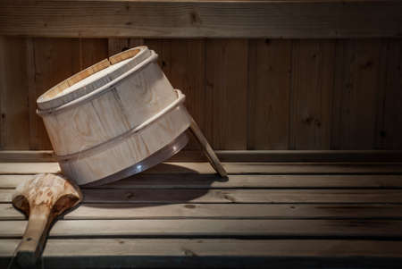 Detail of Wooden bucket in a sauna, relaxation concept.の写真素材