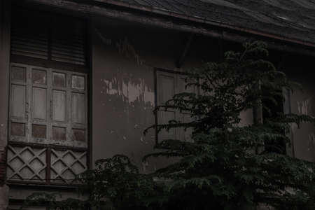 Wall of an old window in an abandoned old building. Vintage effect.の写真素材