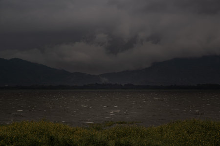The beauty of Bang Phra Reservoir on the background of misty capped mountains, Chonburi Province,...