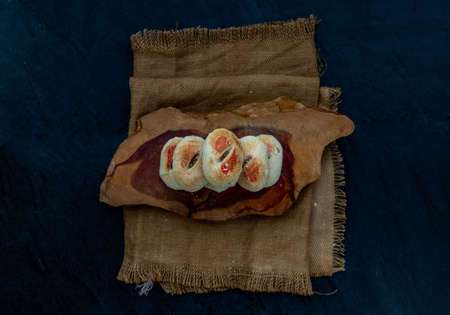 Chinese Pastry (Happiness pastry) on wooden. This type of traditional chinese pastry is typically shared with friends and relatives during happy occasions, especially wedding ceremonies, Top view.の写真素材