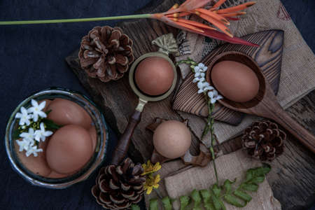 Fresh farm eggs on beautiful wooden background, Nutrition concept, Selective focus, The view from the top.の写真素材