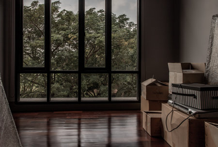 Bangkok, Thailand - 15 Dec 2019 : Empty room with Storage box and windows in loft style. Wooden...