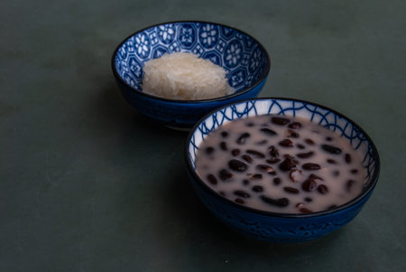 Kanom Thai : Sweet Sticky Rice & Black Beans in Coconut Milk. Thai Dessert for healthy, Oblique view...
