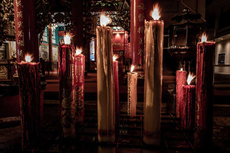 Bangkok, Thailand - 13 Dec 2019 : Votive candle at Kuan yim shrine (Thian Fah Foundation) a Traditional Chinese temple at Yaowarat Road In The Night.のeditorial素材