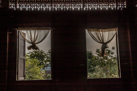 Textured background: Wooden pattern of Window and White lace curtains in traditional thai house,...