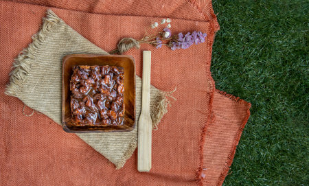 Traditional homemade sweet bread : Walnut toffee cake with caramel on beautiful background. One...